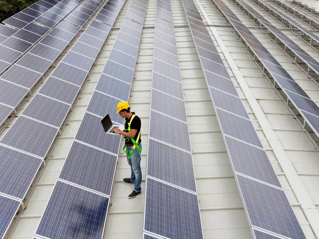 Solar Engineer Checking Data