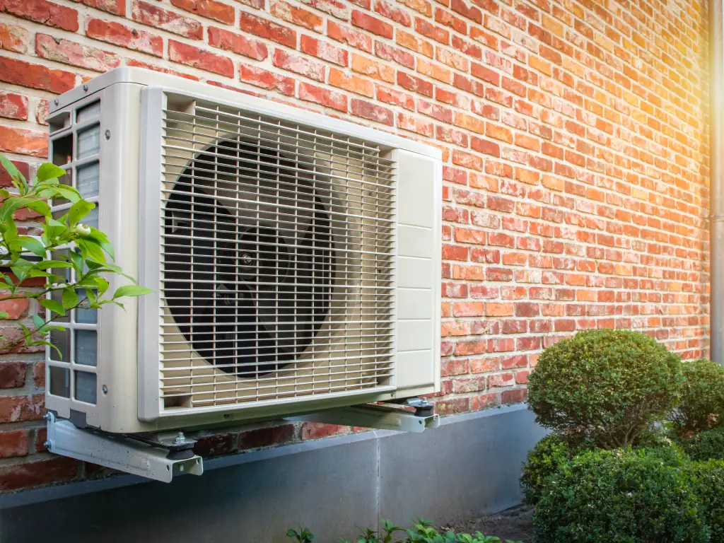 Air Source Heat Pump on Brick Building